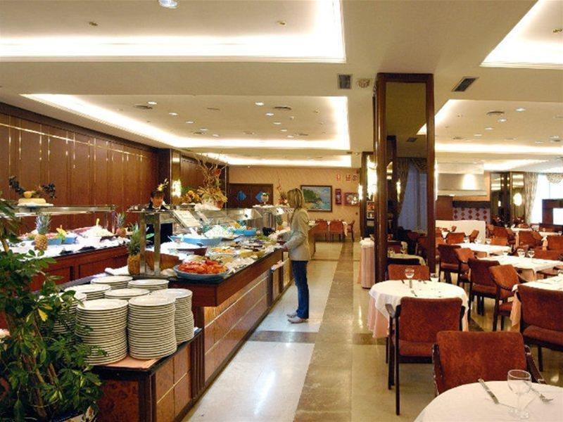 Evenia Olympic Garden Hotel Lloret de Mar Bagian luar foto